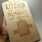 Personalised Wooden Beech Cutting Board with Handle - In this kitchen we count memories... - 39.5x18.5x1.5cm