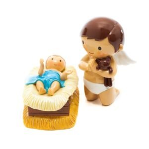 Boy praying to Baby Jesus